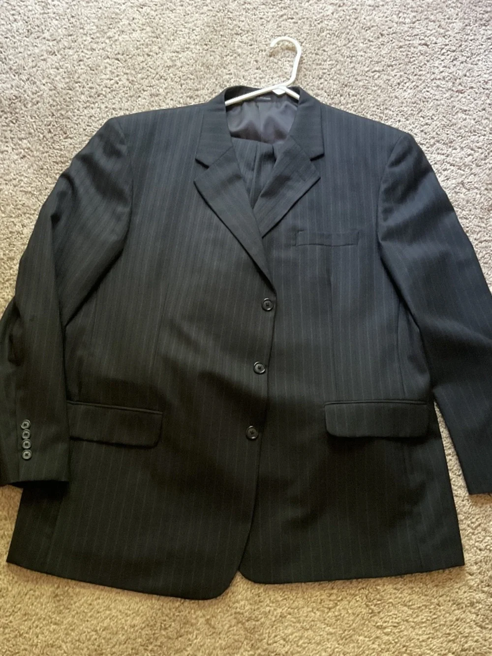Men’s suit, worn once